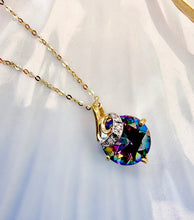 Indlæs billede til gallerivisning 10 karat guld vedhæng med mystisk topas mystisk & diamanter